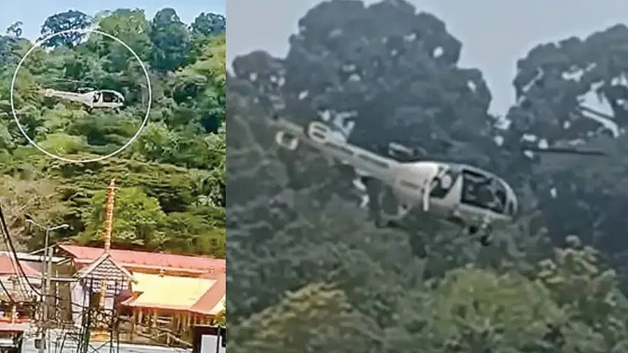 சபரிமலை கோயில் மீது பறந்த ஹெலிகாப்டர்